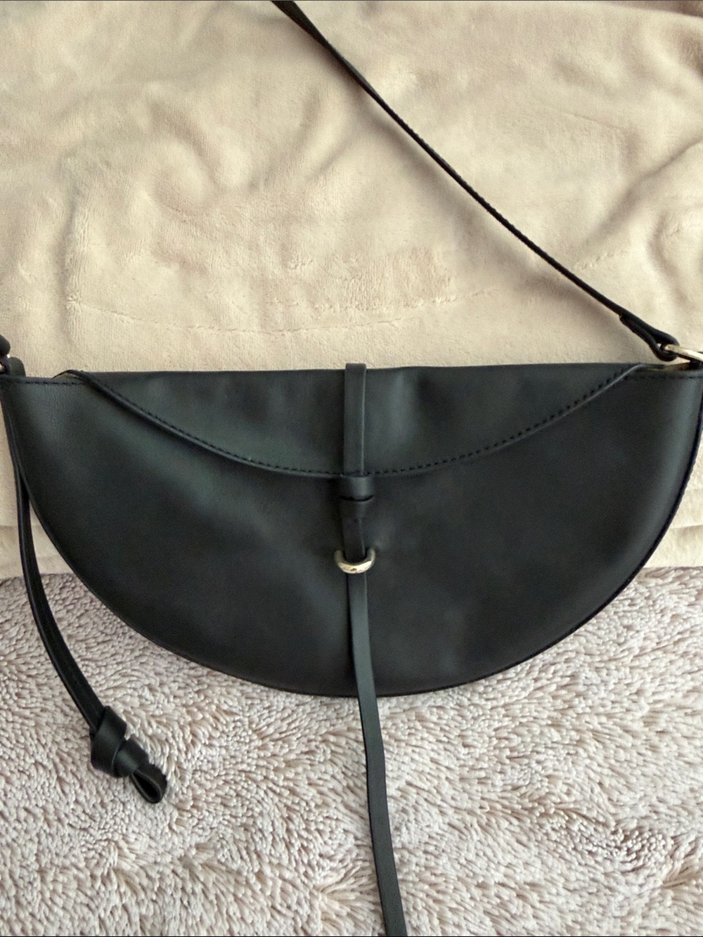 Black Half-Moon Crossbody Bag with Ring Accent